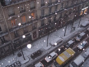 Snow falling outside our hotel window, day 5 in Paris